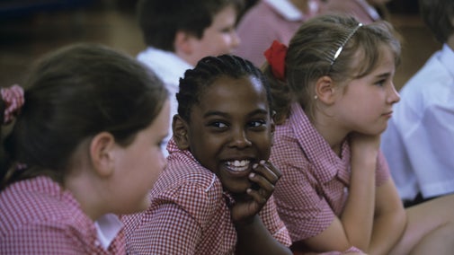 School children watching a performance of NT theatre in education in the 'Going, Going Gone' tour